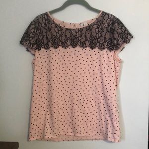 Lovely pink and black polka dot blouse with black lace overlay on top.